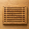 The Alba Olive Wood Bread Board with Crumb Tray seen from above, the full grain readable
