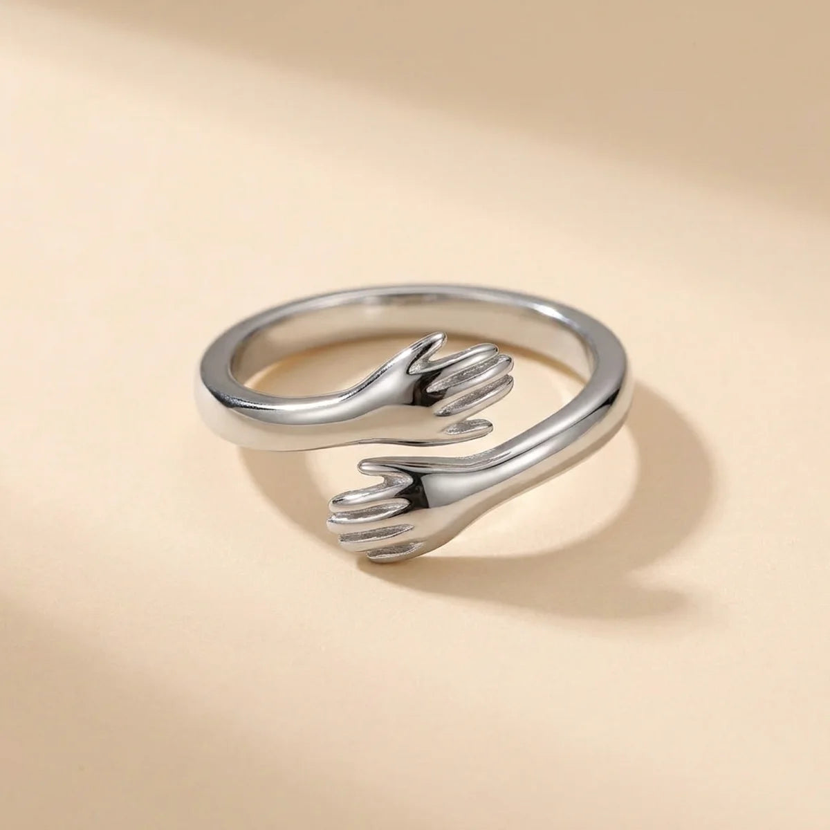 The Hug Ring seen from above, the two hands of the band readable