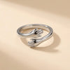 The Hug Ring seen from above, the two hands of the band readable