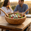 The Alba Olive Wood Salad Bowl in use on a dining table