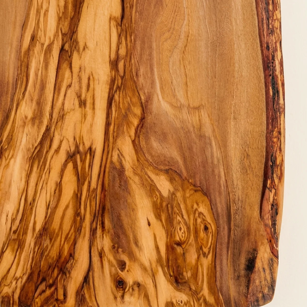 Macro of the olive grain of the Alba Live-Edge Olive Wood Slab
