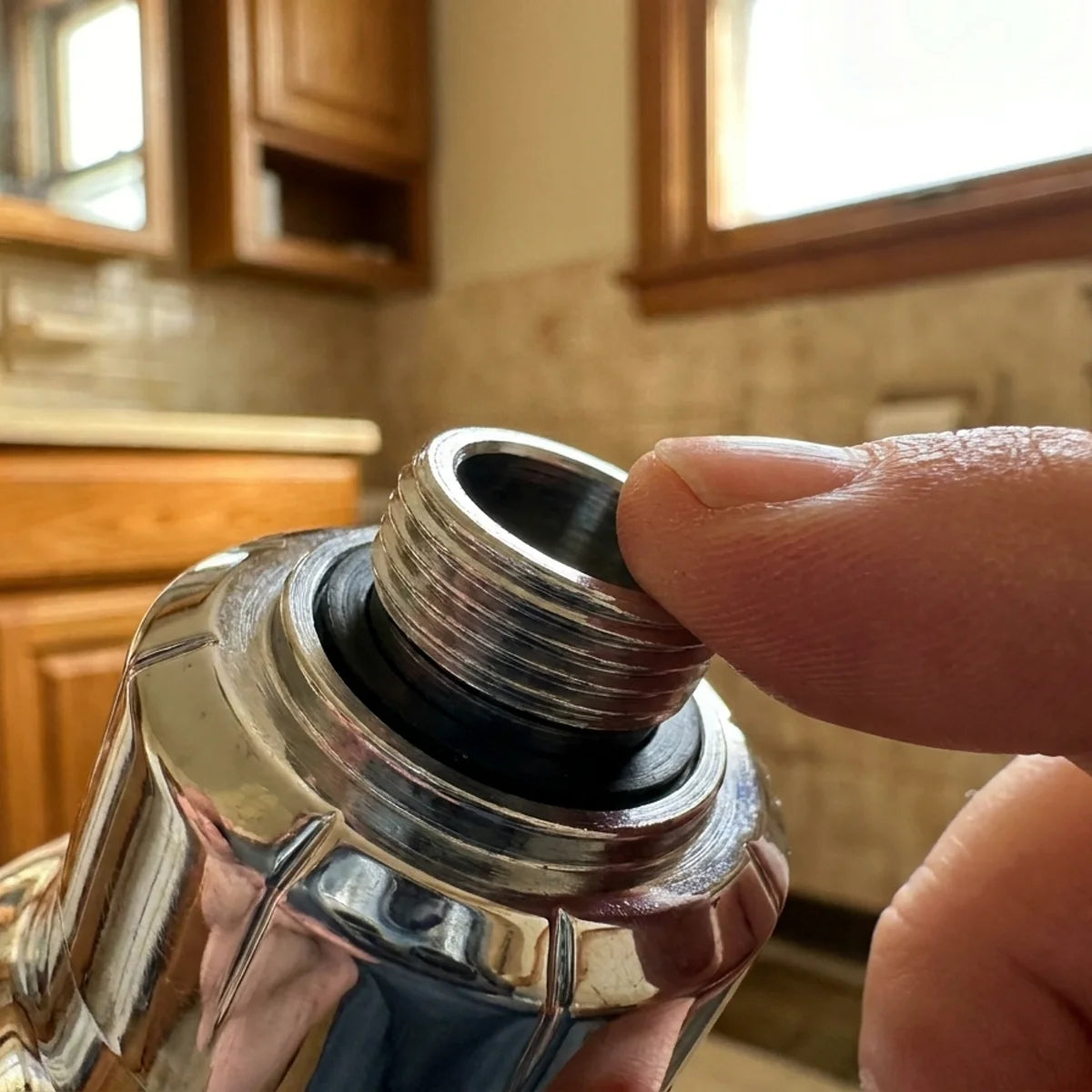 Close-up of the half inch threaded inlet and its washer