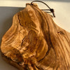 Macro of the olive grain of the Alba Olive Wood Board with Leather Loop