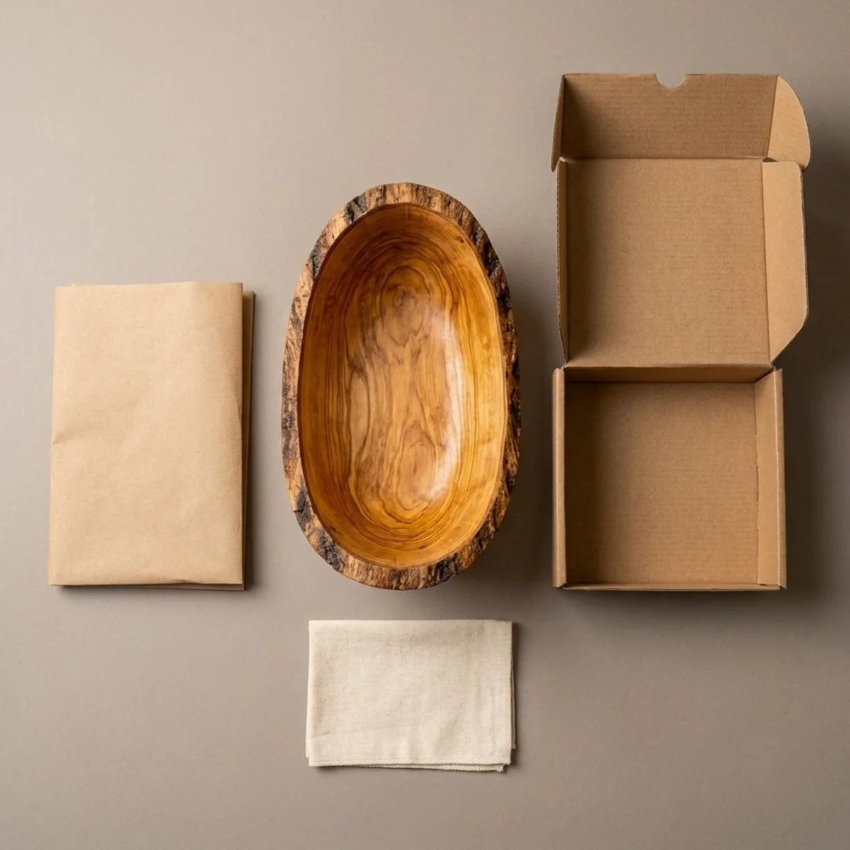 The bowl with its kraft wrapping and plain shipping box