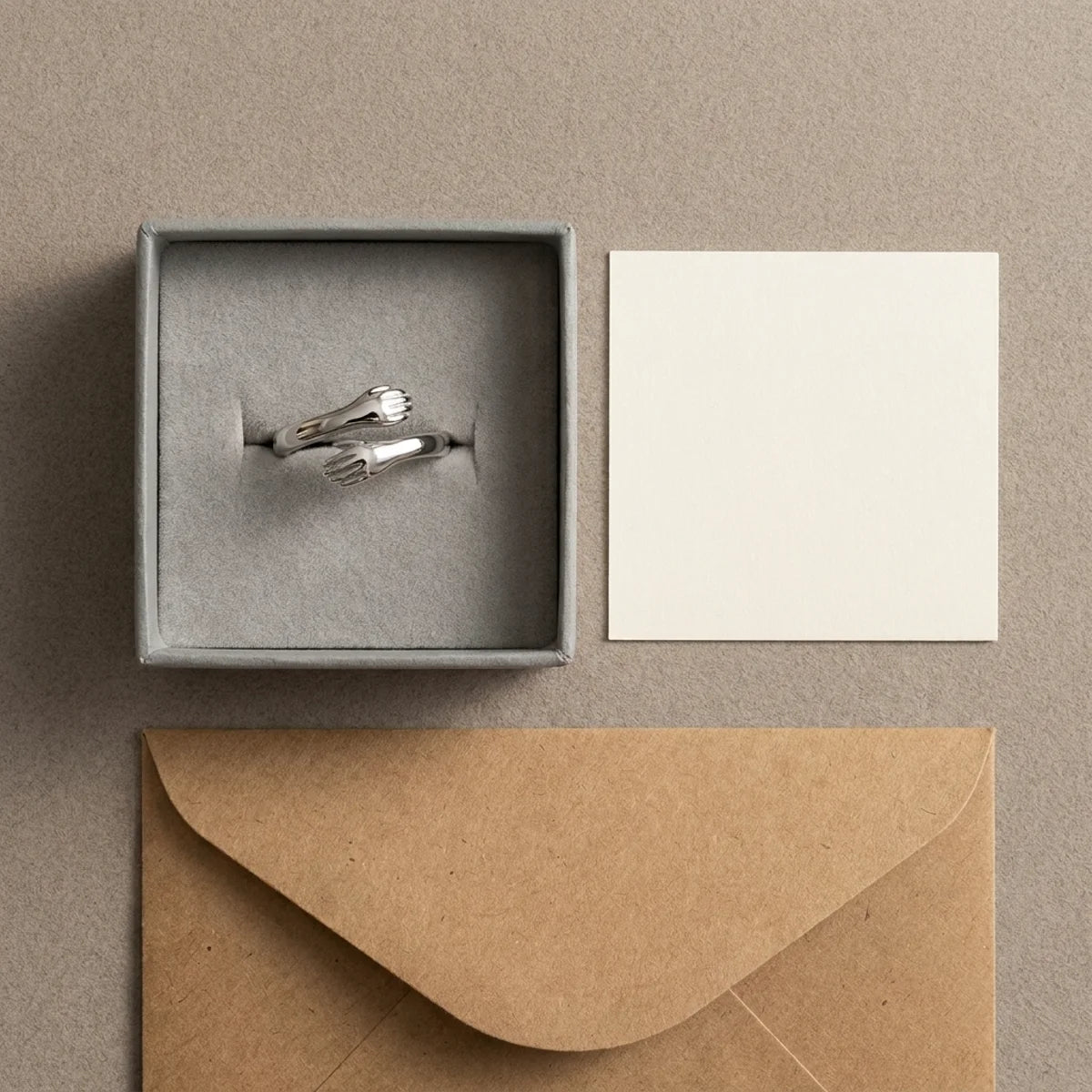 The Hug Ring with its gift box, card and mailer