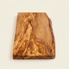 The Alba Live-Edge Olive Wood Slab alone on a plain background