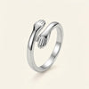 The Hug Ring alone on a plain background
